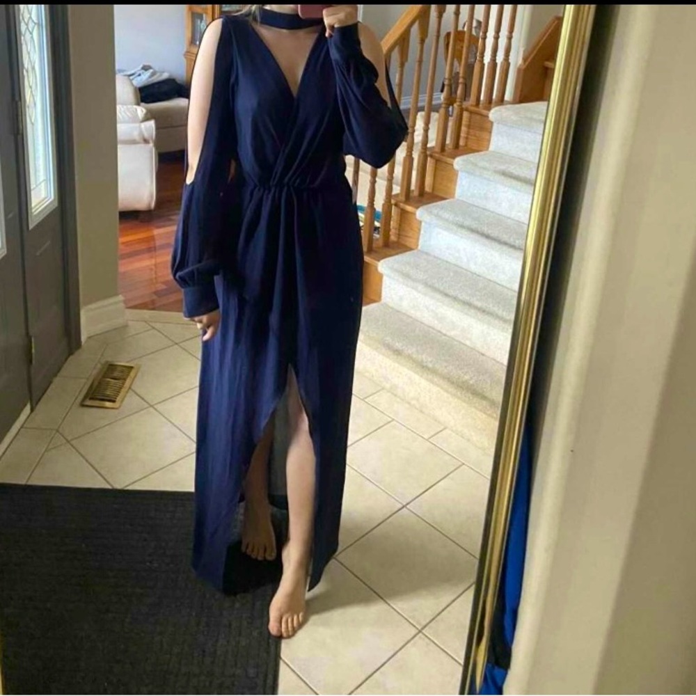 Brand new with tags still on, navy blue, size xs